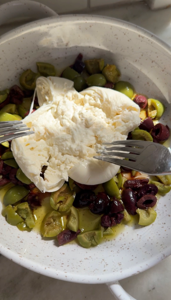 Olives and burrata with toasted sourdough, an easy 10-minute Mediterranean appetizer