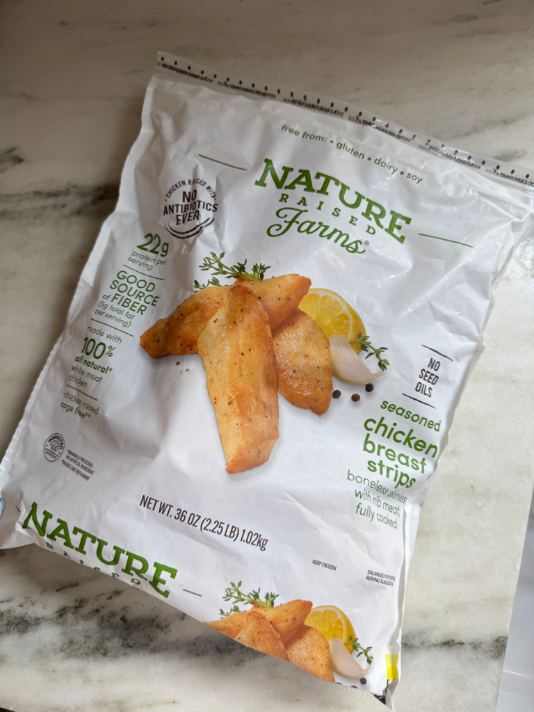 NatureRaised Farms seasoned chicken breast strips package on a counter