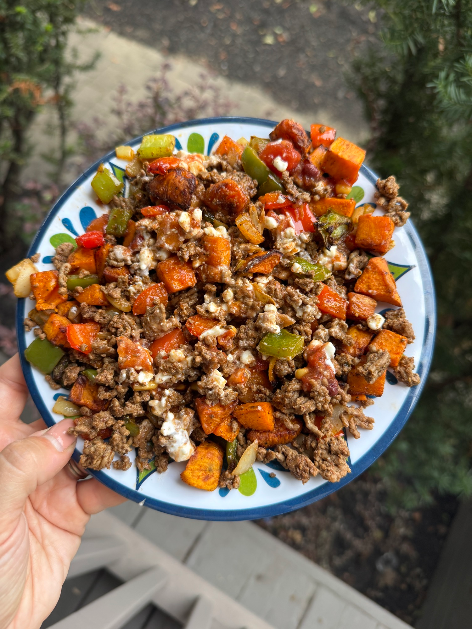 Sweet potato taco bowls tossed together with ground beef, peppers, and cottage cheese
