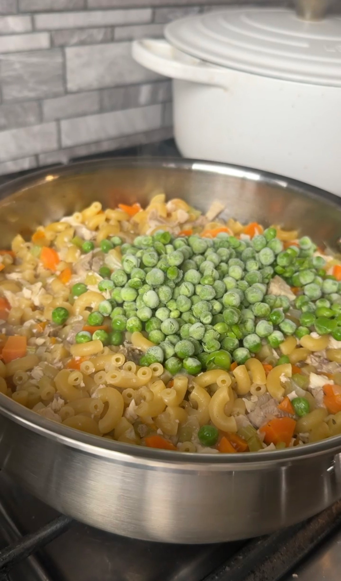 Frozen peas stirred into the cooked macaroni and turkey