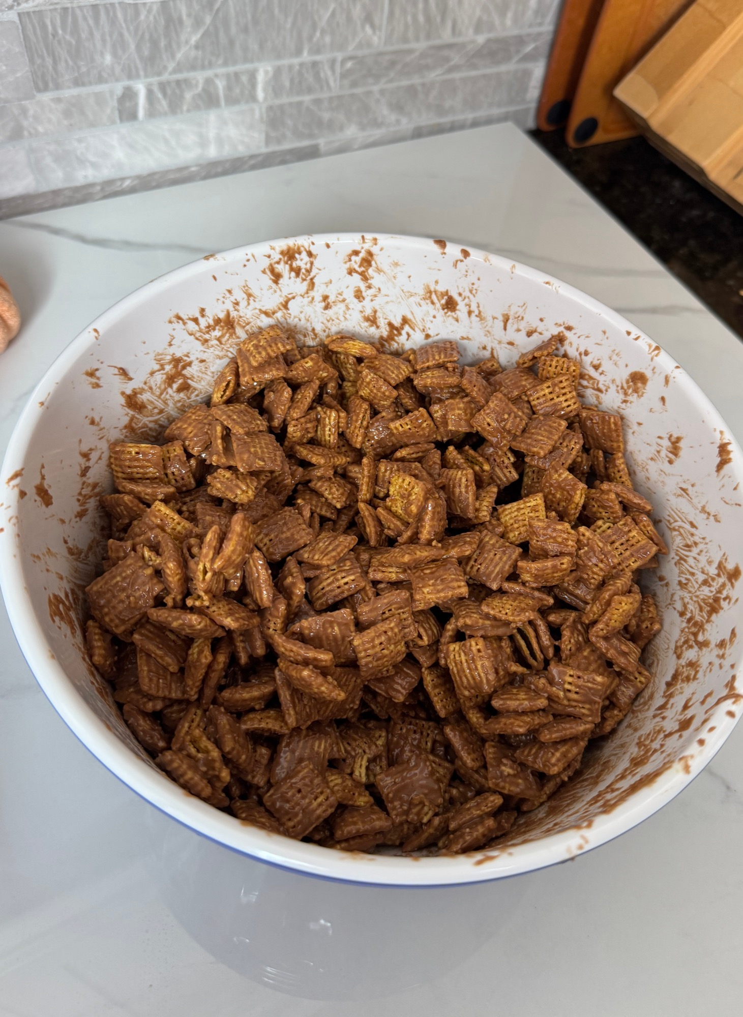 Chex cereal tossed in chocolate and peanut butter