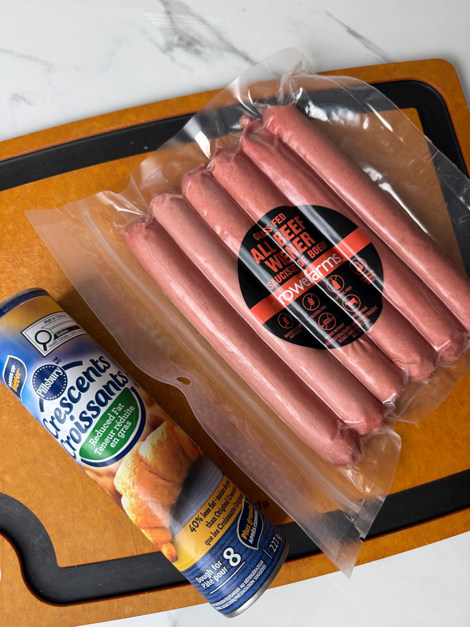 Hot dogs and crescent roll dough for ghost dogs