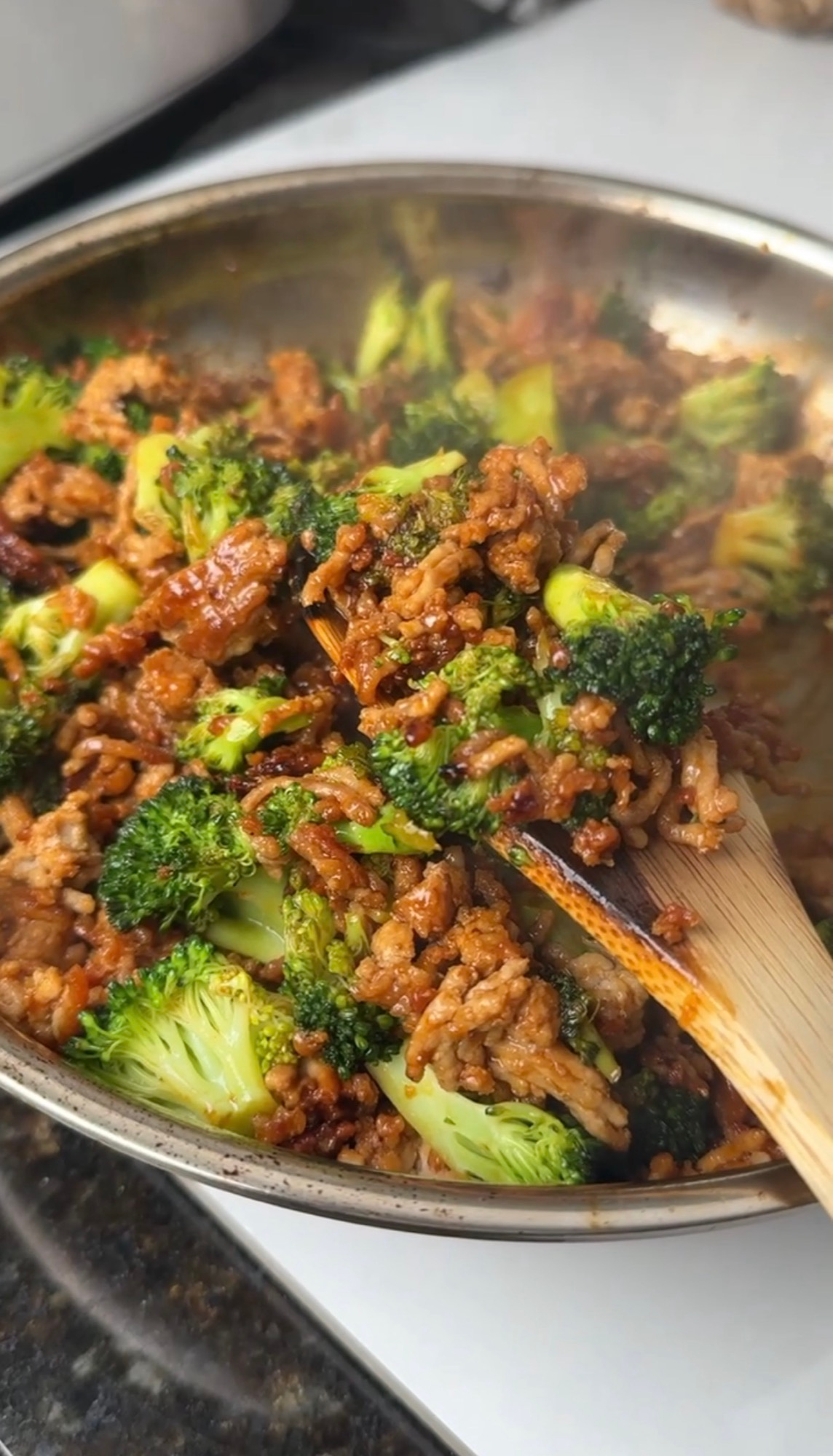 Crispy Korean ground pork and broccoli in a skillet with gochujang sauce