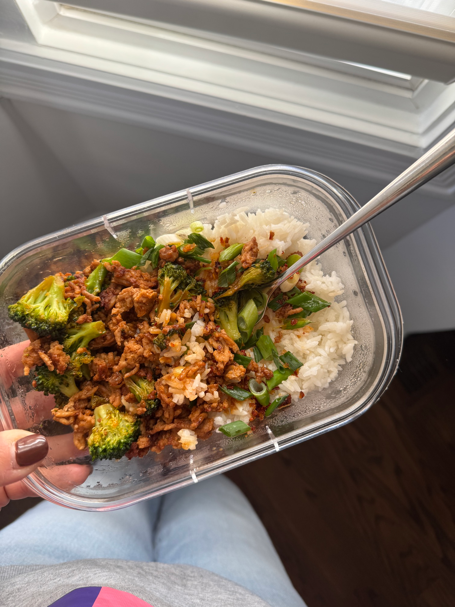 Korean ground pork rice bowl with a fork, ready to eat