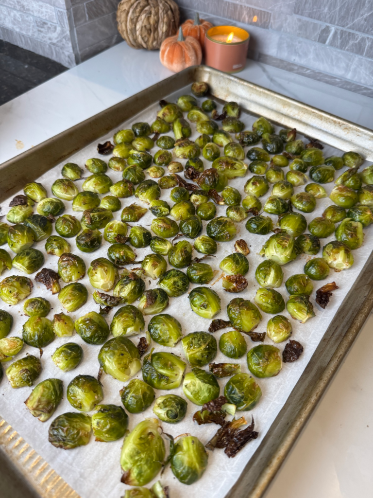 Crispy roasted maple bacon brussels sprouts on a sheet pan