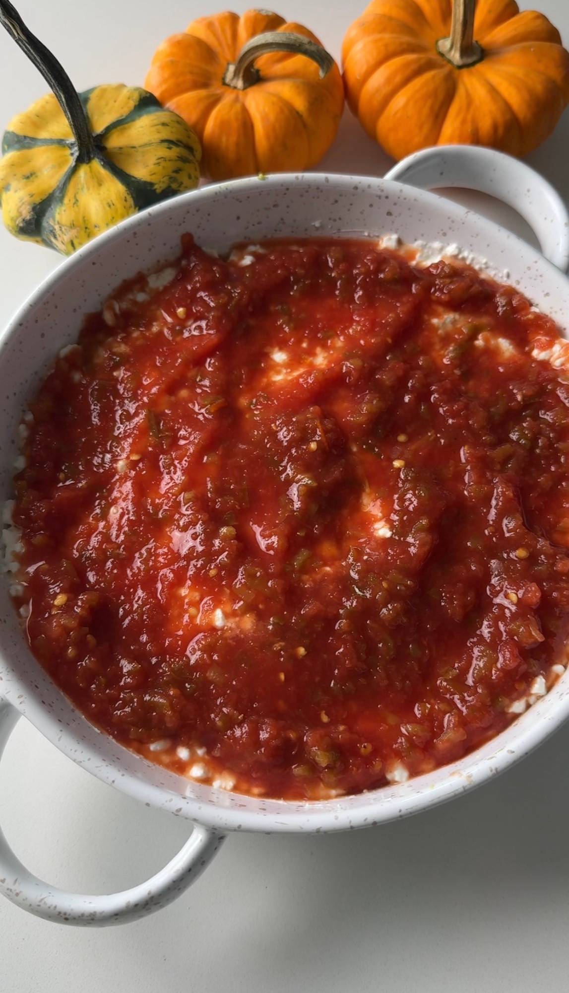 Salsa layer spread over the layered dip