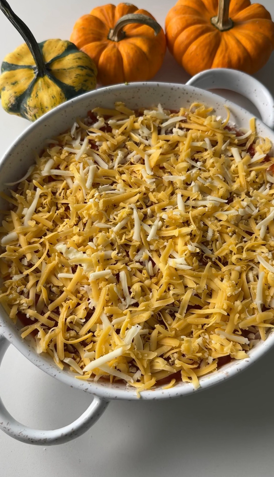 Shredded cheese layer on the layered dip