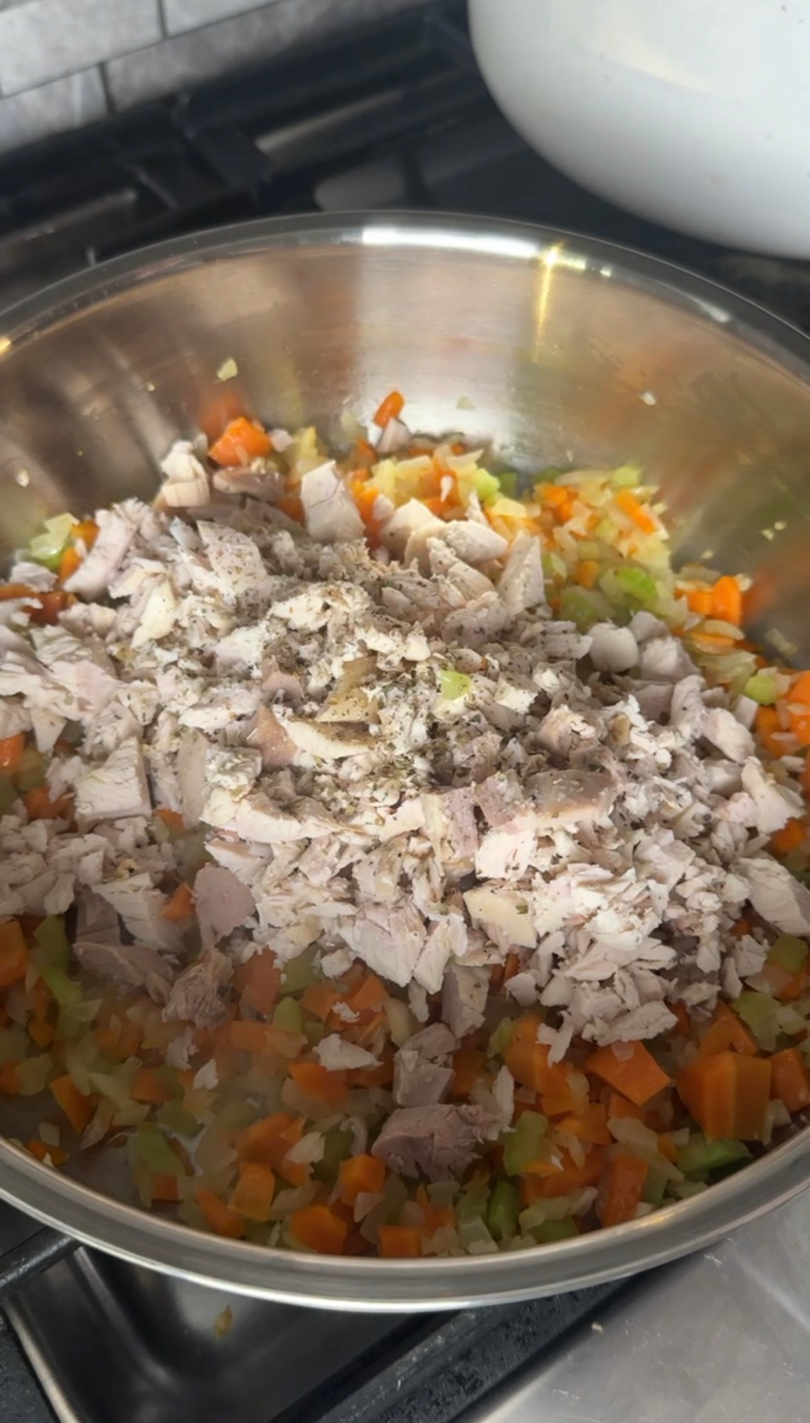 Diced leftover turkey and seasoning added to sauteed onion, carrot, and celery